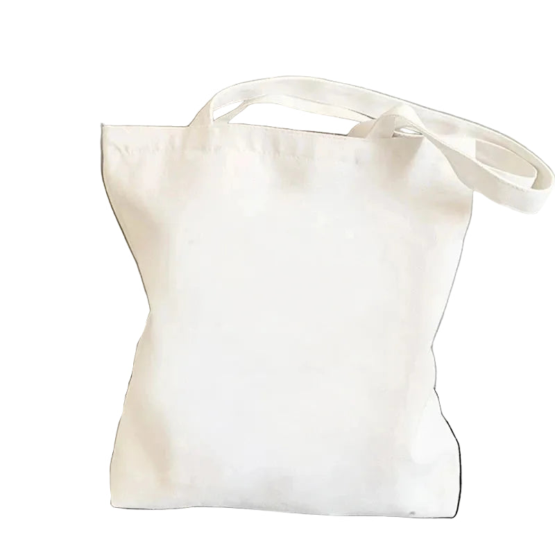 Plain cream canvas tote bag with long shoulder straps on a white background