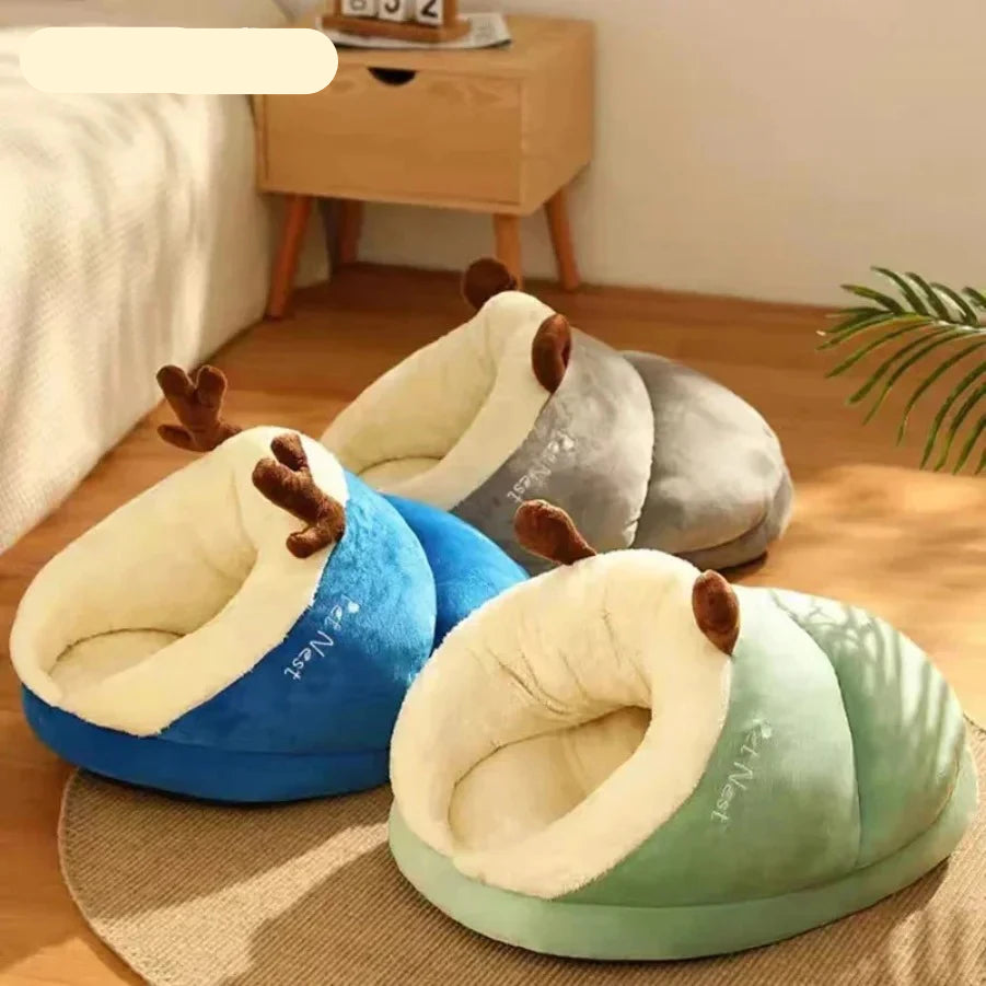 Plush covered pet beds in green, blue and grey with soft cream lining and playful antennae design