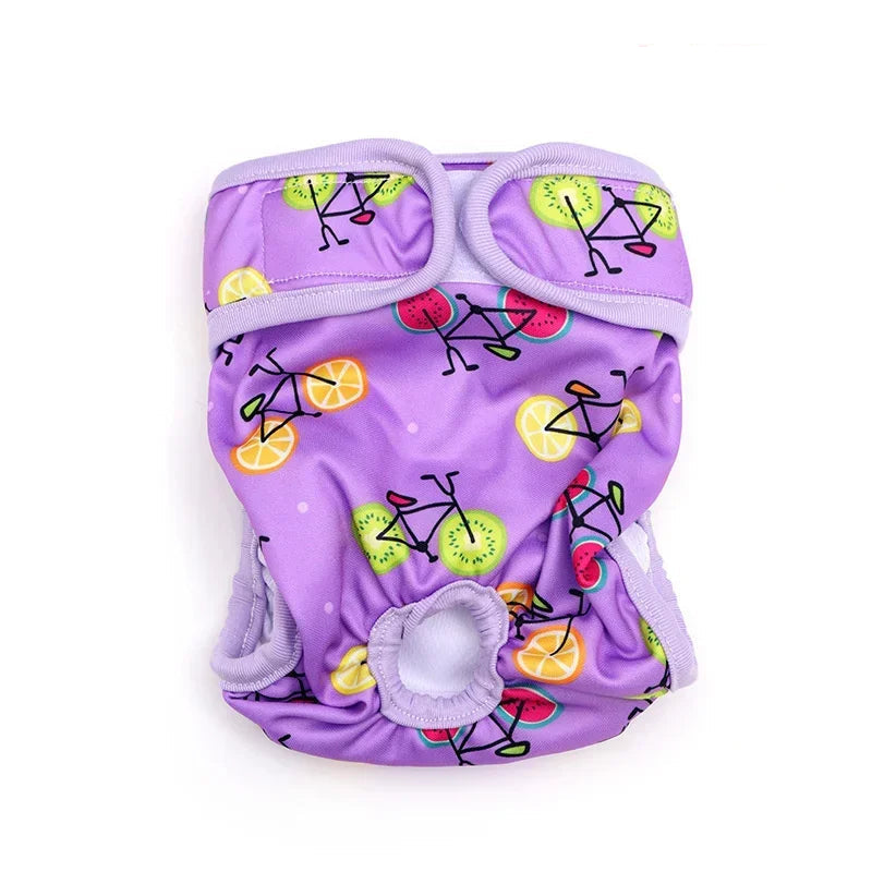 Purple reusable female dog diaper with colourful fruit and bicycle print, tail hole and adjustable fastening