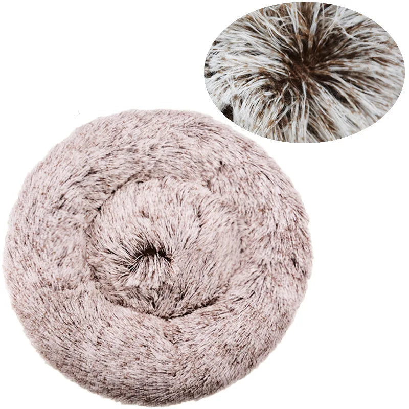 Round plush donut pet bed with soft faux fur and raised cushioned sides for cats and small dogs