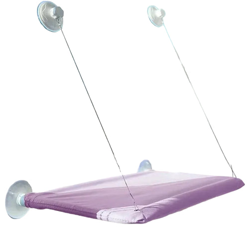 The hammock in purple, mounted on a window