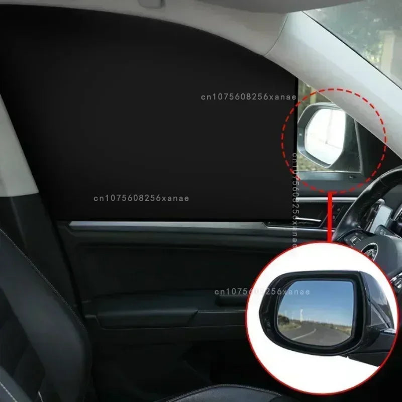 The shade in place on a side window, seen from inside the car