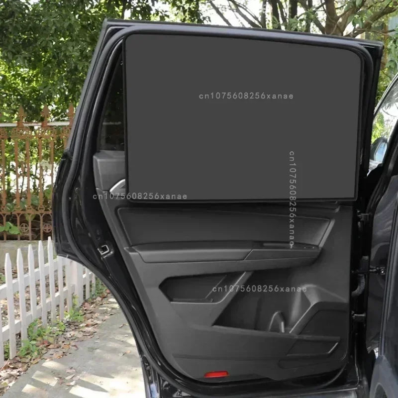 The shade covering a rear side window, seen from outside