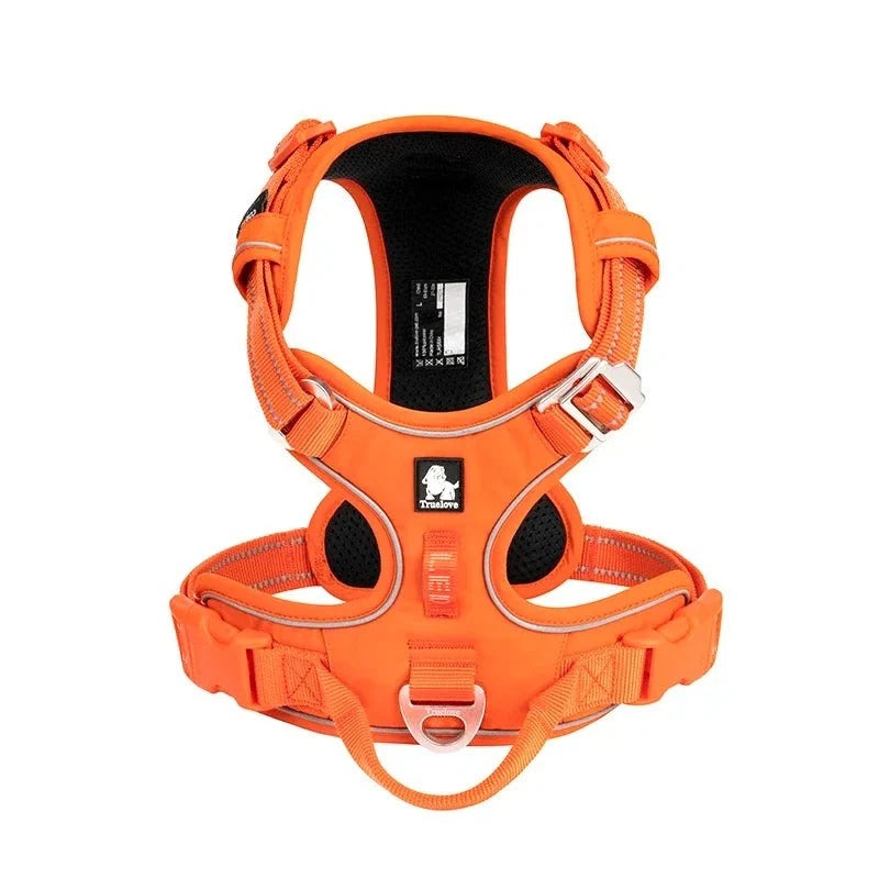 Padded dog travel harness in orange, front view on white