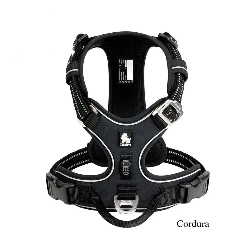 Patterned dog travel harness in floral navy, front view on white