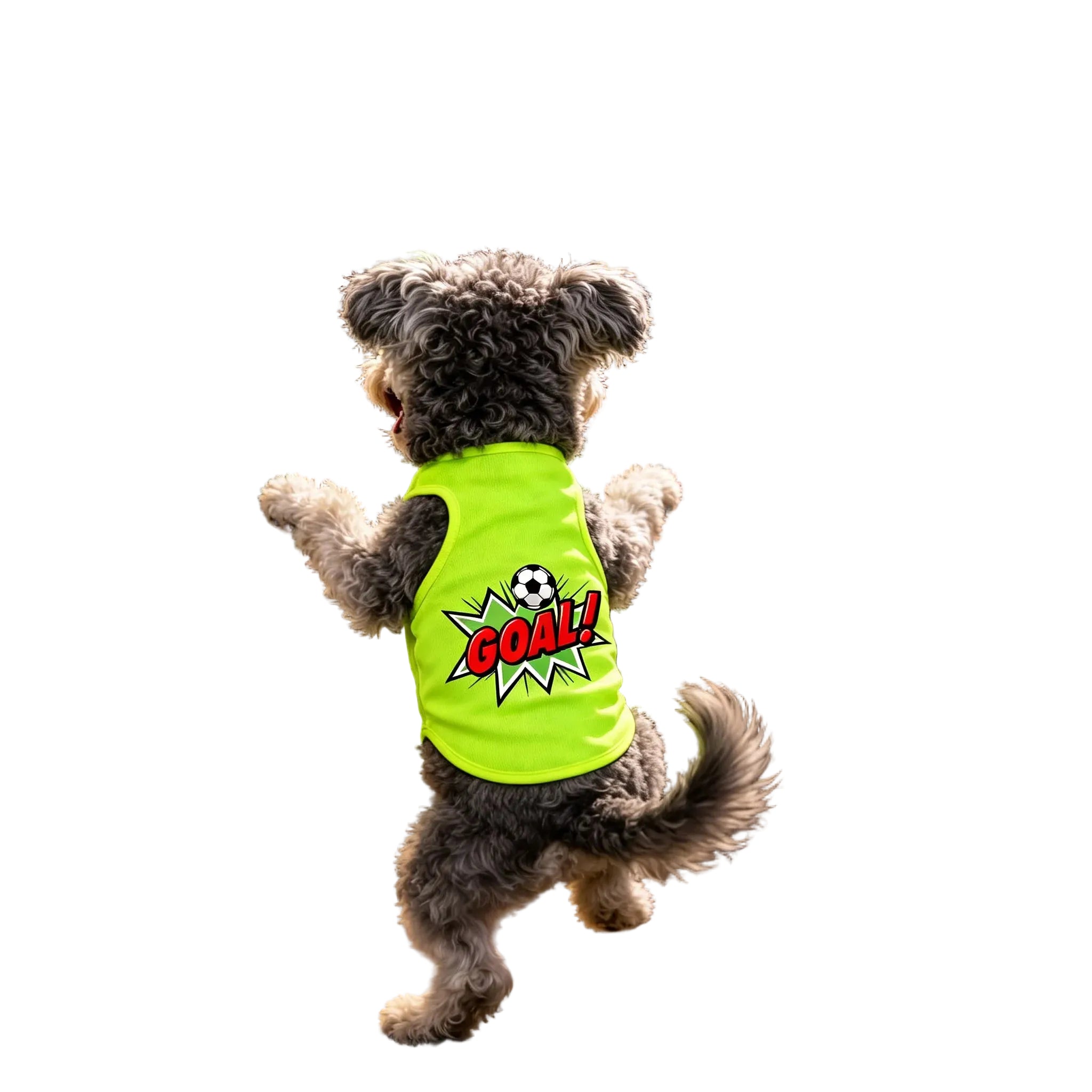 Small dog jumping while wearing a bright green dog shirt with a soccer ball and GOAL graphic on the back