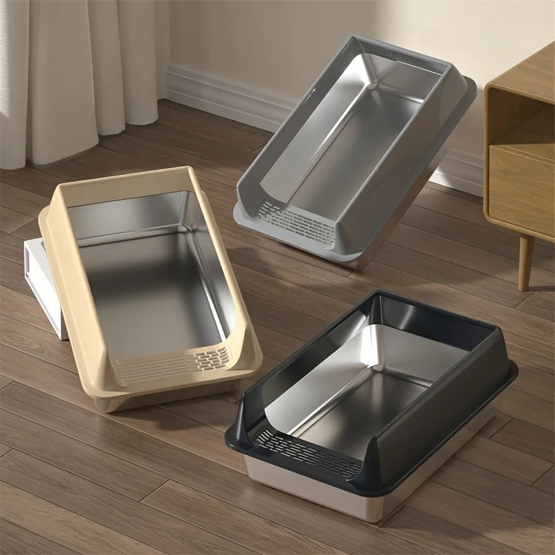 Stainless steel cat litter box with high sides and a low front entry for easy access