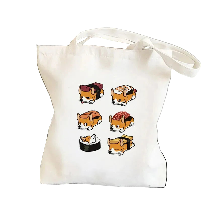 Cream canvas tote bag featuring six cartoon Corgis styled as different sushi pieces
