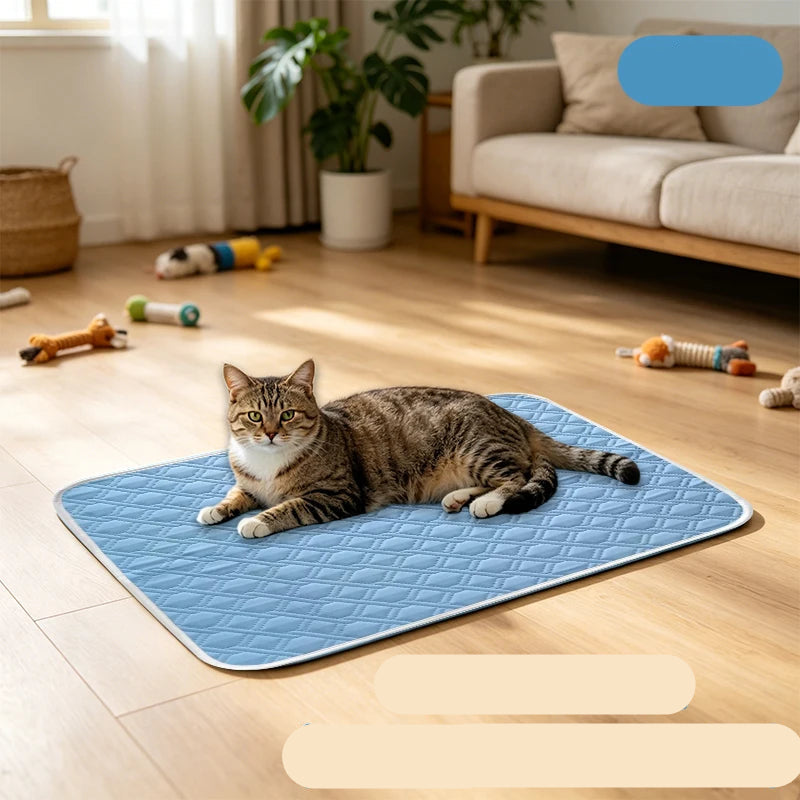 Tabby cat lying on a blue quilted pet cooling mat on a wooden floor in a living room
