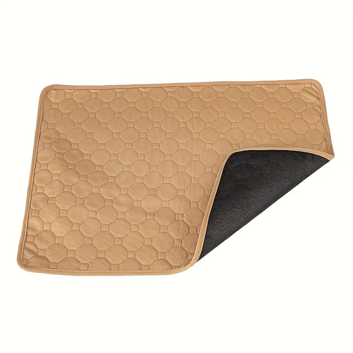 Tan quilted dog bed mat with padded honeycomb stitching and black backing shown at the corner