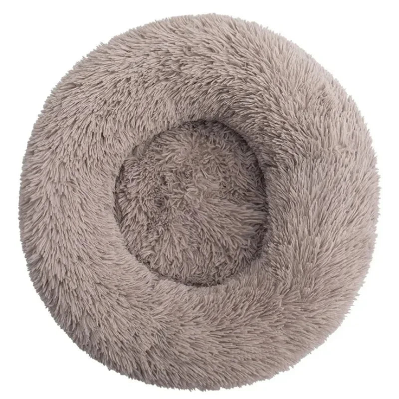 Taupe round plush donut pet bed with soft faux fur and raised cushioned sides for cats and small dogs