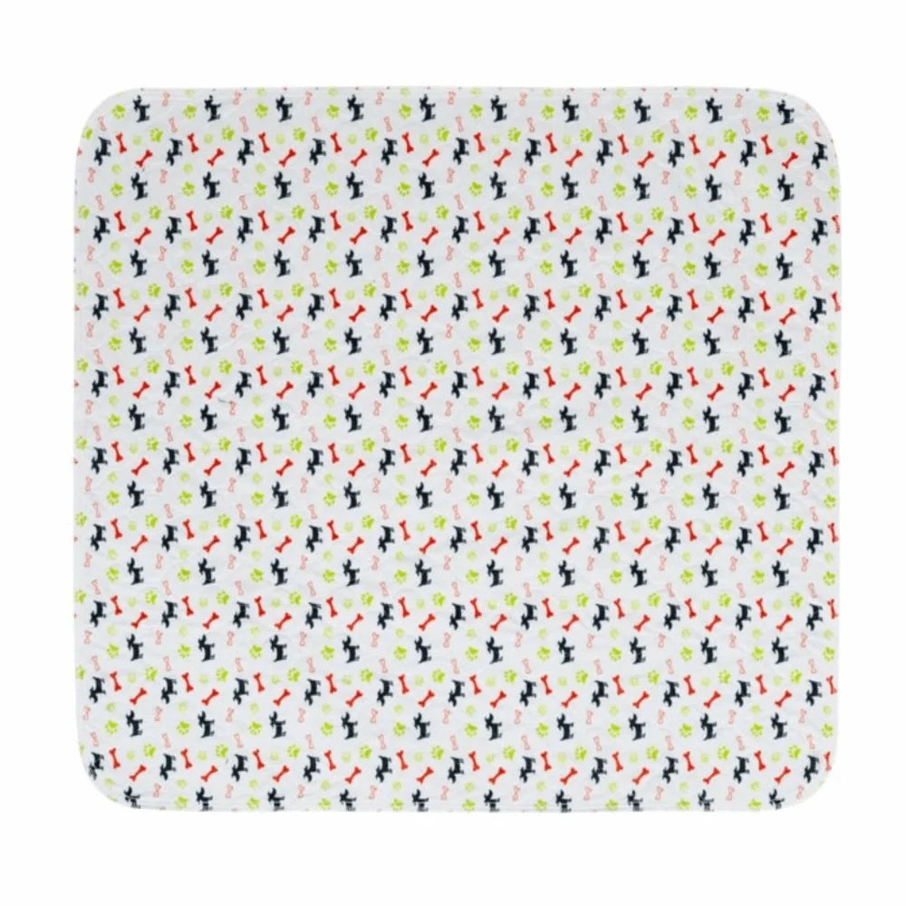 White rectangular dog bed mat with colourful dog, bone and paw print pattern and rounded corners
